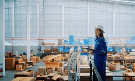 Female Engineer Overseeing Warehouse Operation