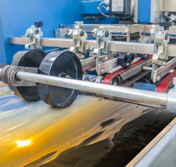 Close up of an offset printing machine during production