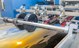 Close up of an offset printing machine during production