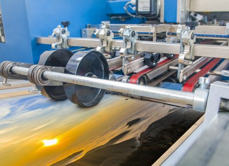 Close up of an offset printing machine during production