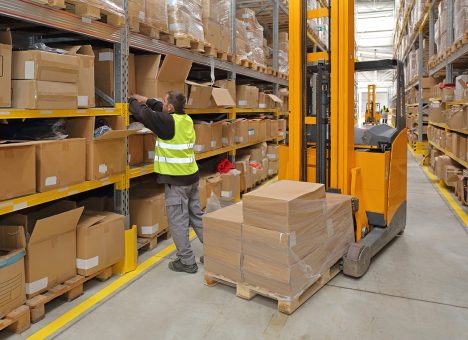 Worker Order Picking in Fulfillment Warehouse