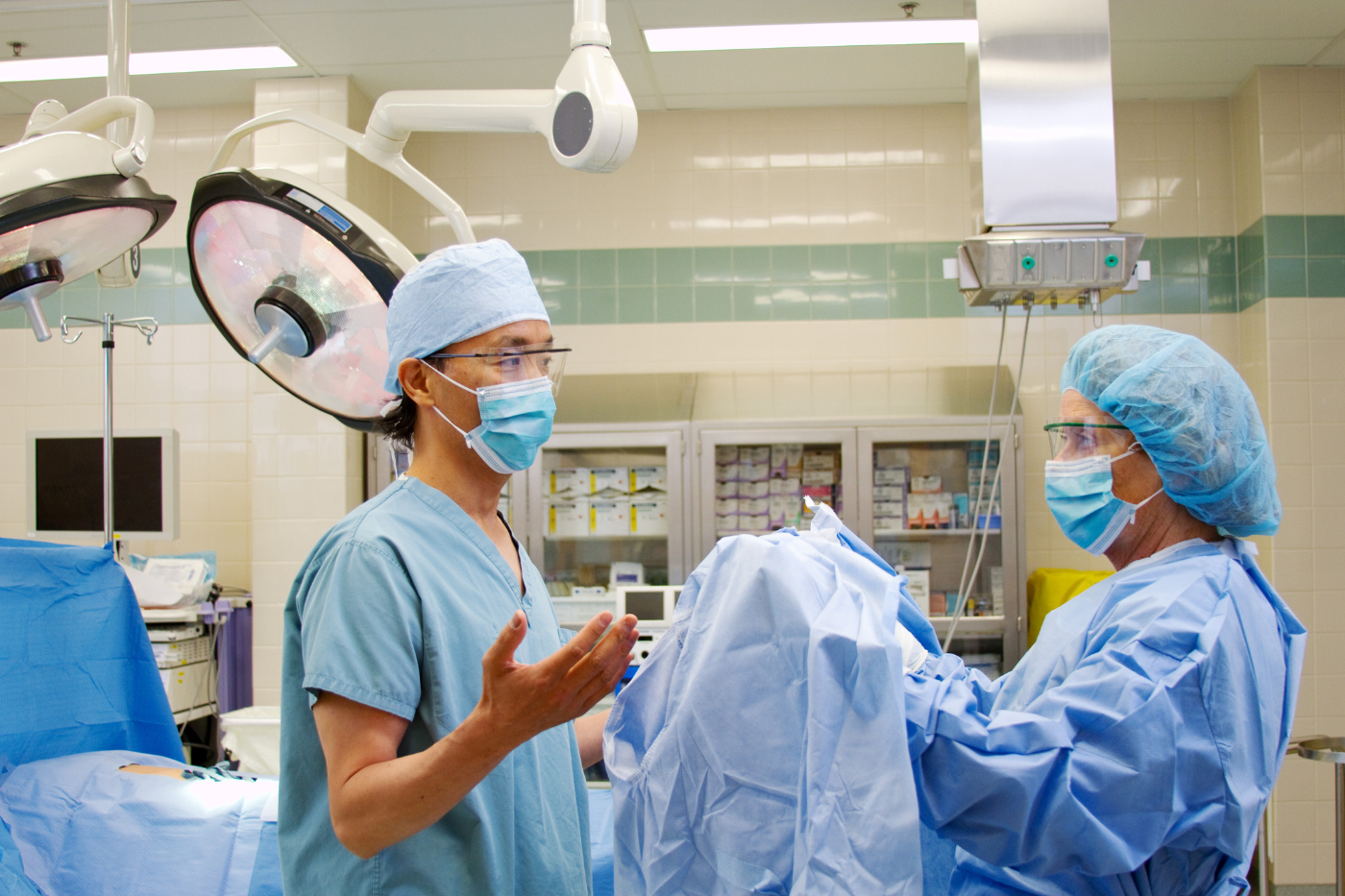 Medical professionals in surgical gowns