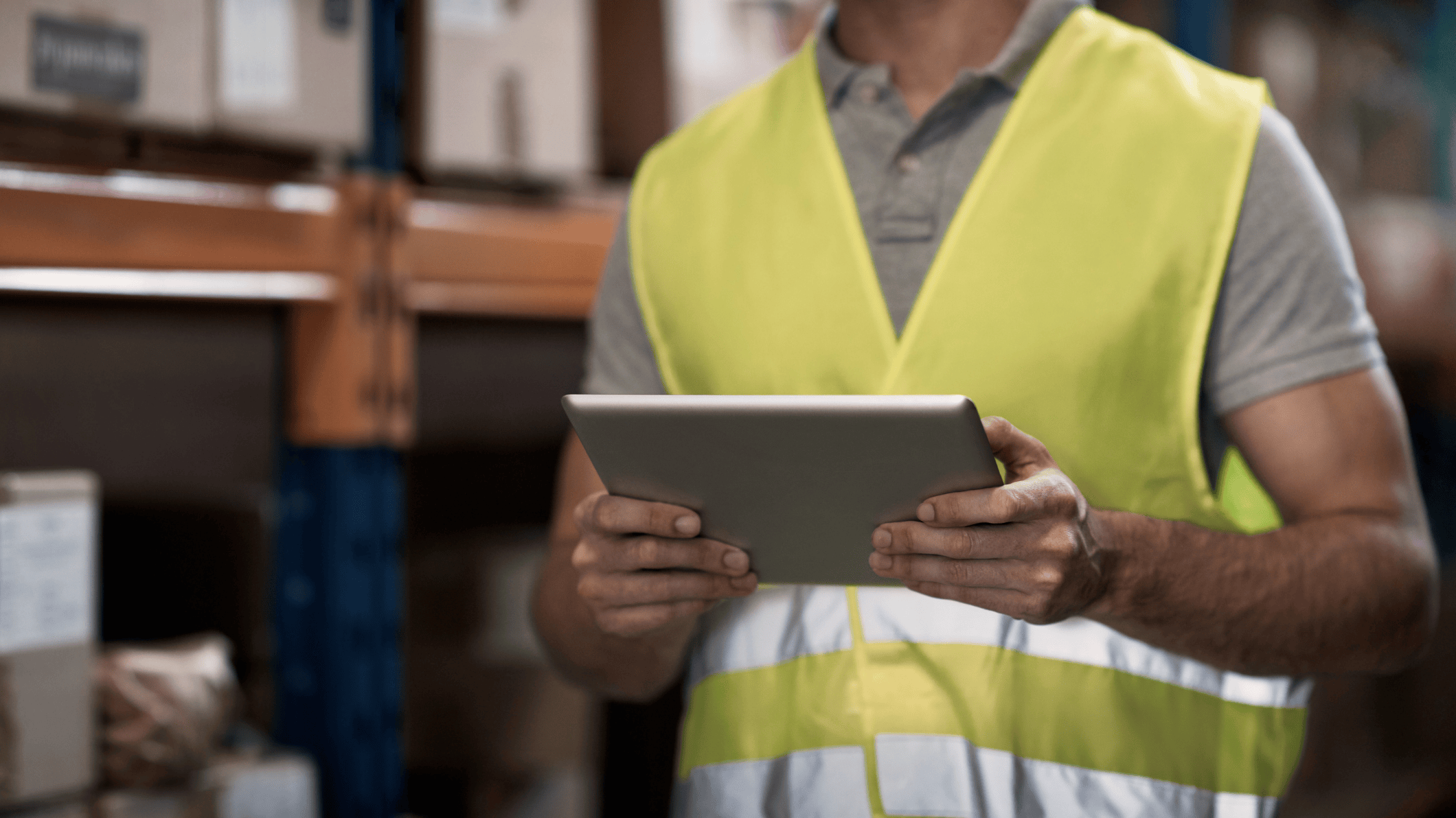 A warehouse worker with an ipad