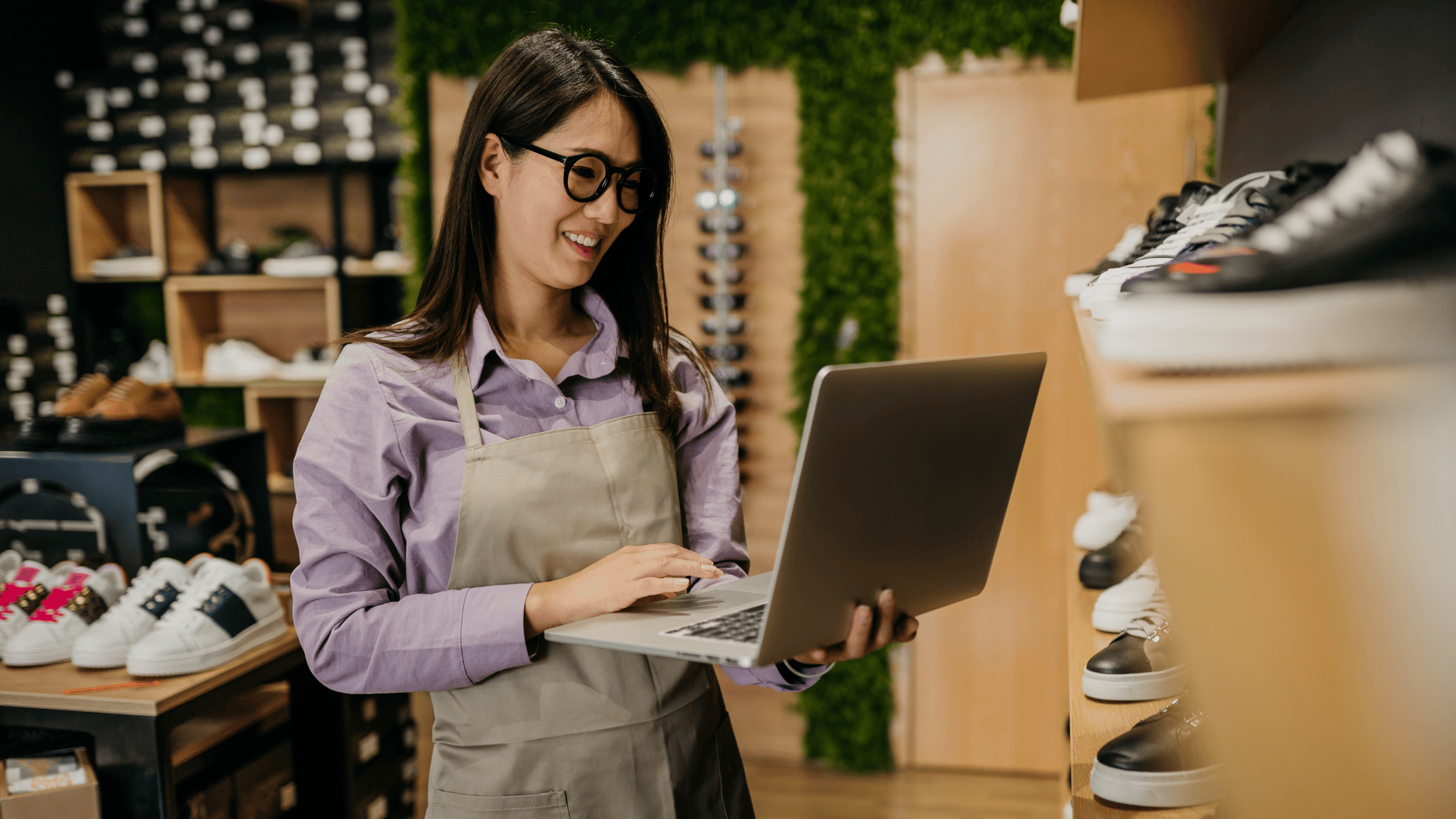 A woman working at a shoe store